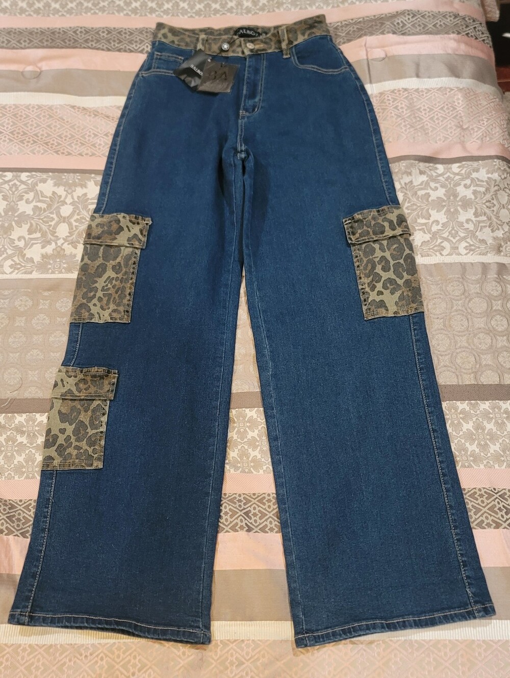 Dark Blue Wide-Leg Jeans with Leopard Cargo Pockets.